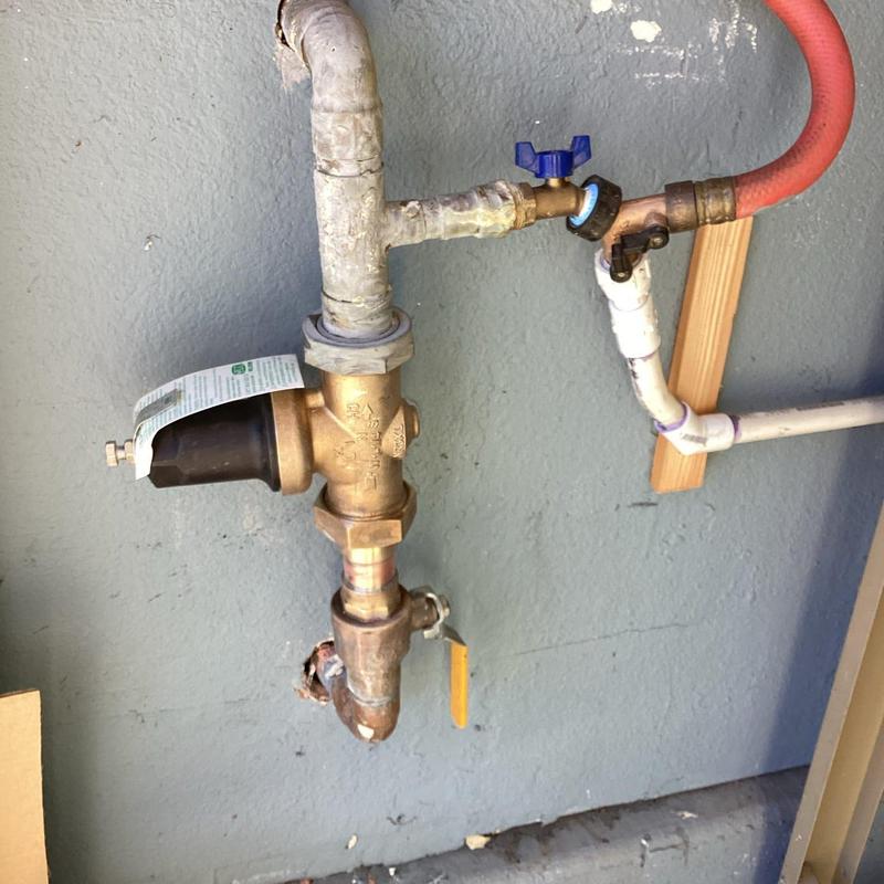 Wilkins pressure regulator and piping installation