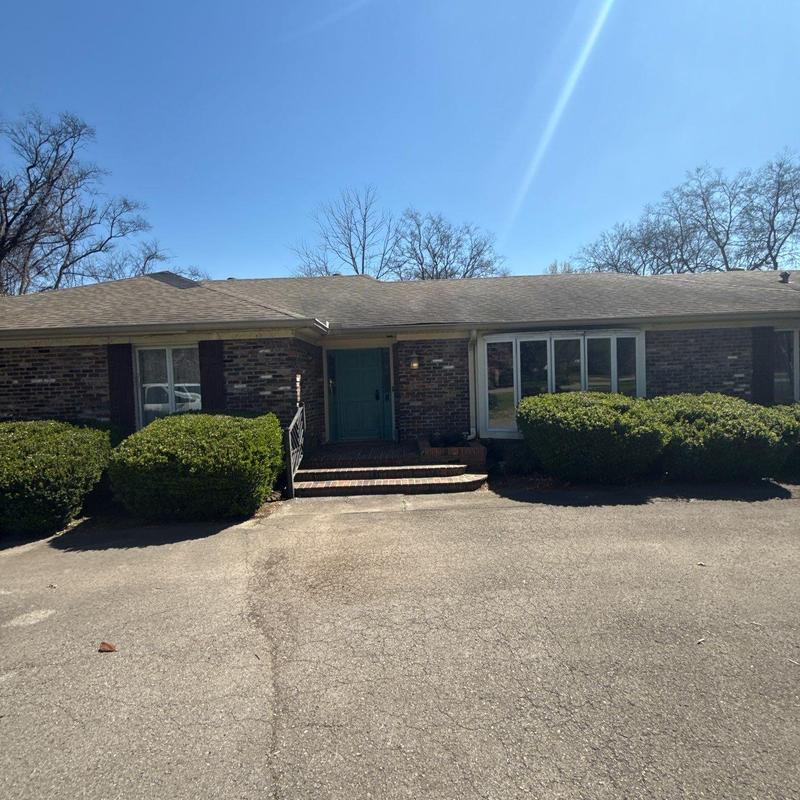 Asphalt shingle roof with hail damage inspection