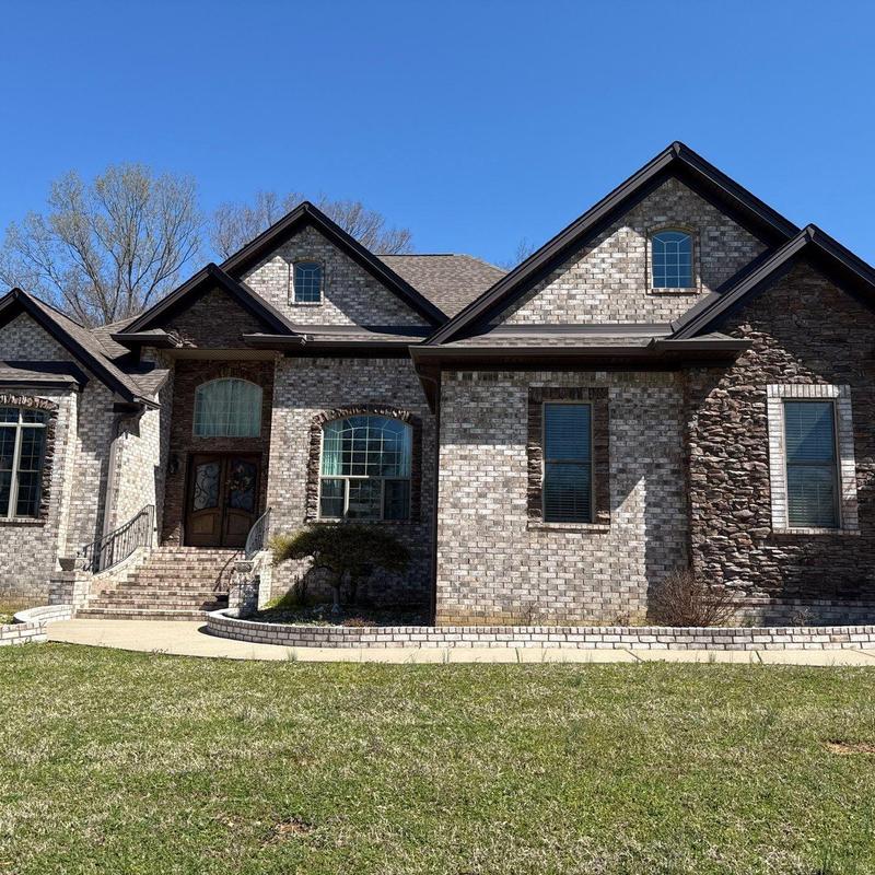 Asphalt shingle roof with hail damage inspection