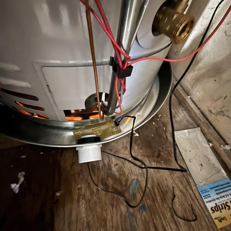 Gas water heater burner assembly with wiring and piping