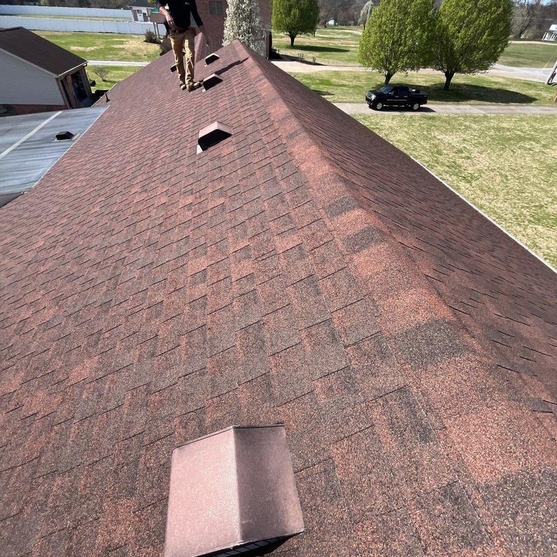 Asphalt shingle roof with ventilation inspection