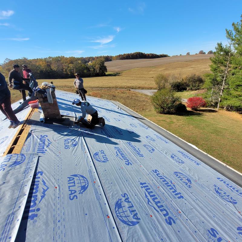 Roof underlayment installation on residential roof system