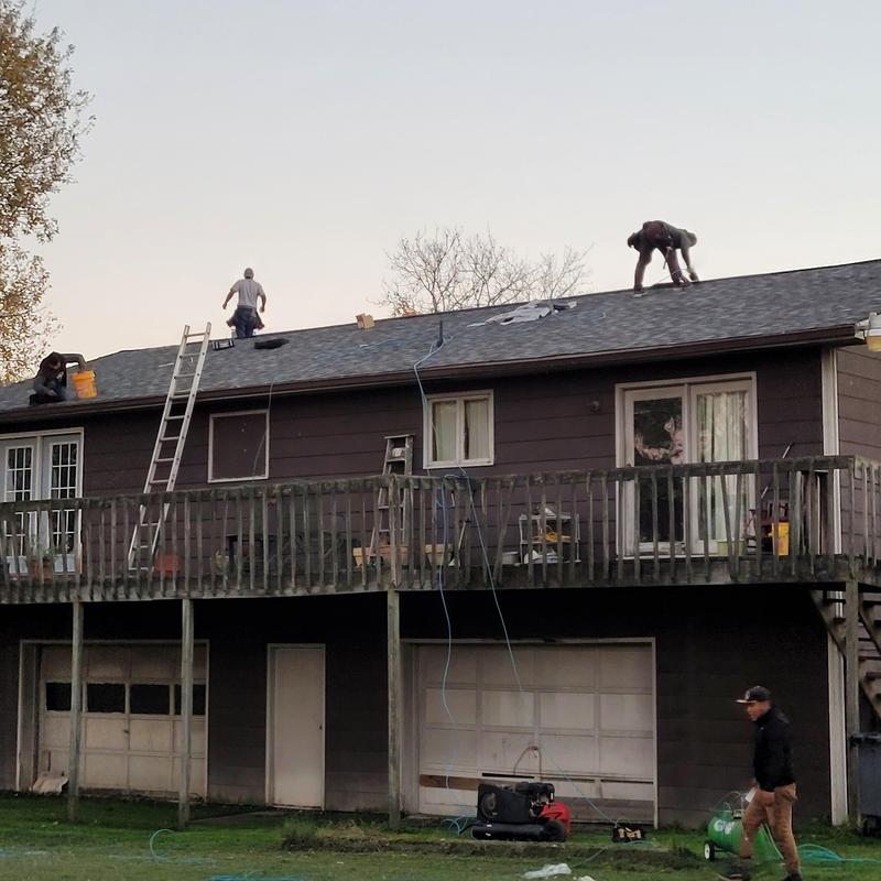 Coastal Granite shingles installation on residential roof