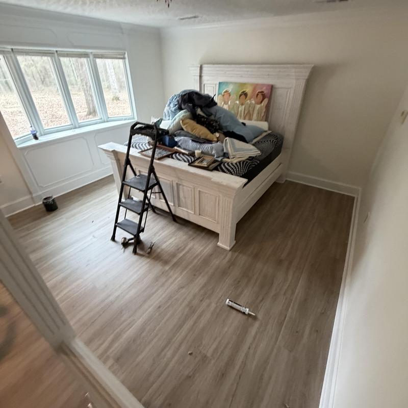 Vinyl plank flooring installation in bedroom Vinyl plank flooring installation in bedroom