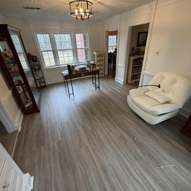 Vinyl plank flooring installation in living room Vinyl plank flooring installation in living room