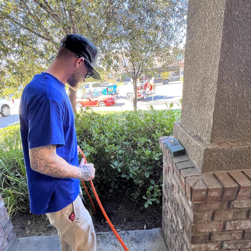 Bathroom toilet drain pipe root removal with hydro jetting