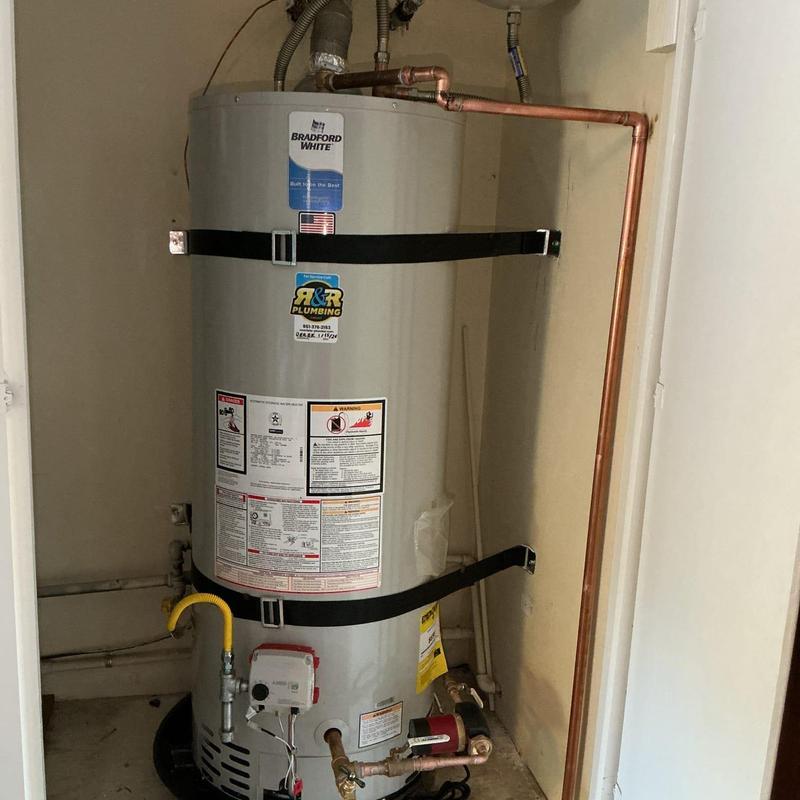 50-gallon water heater with new copper piping installation