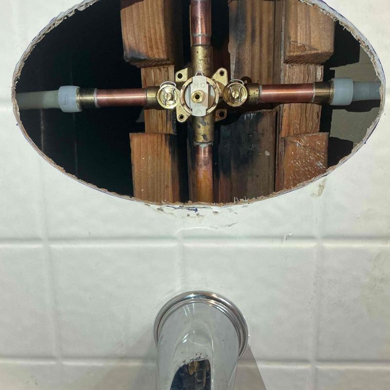 Shower valve and copper supply lines inside wall cavity