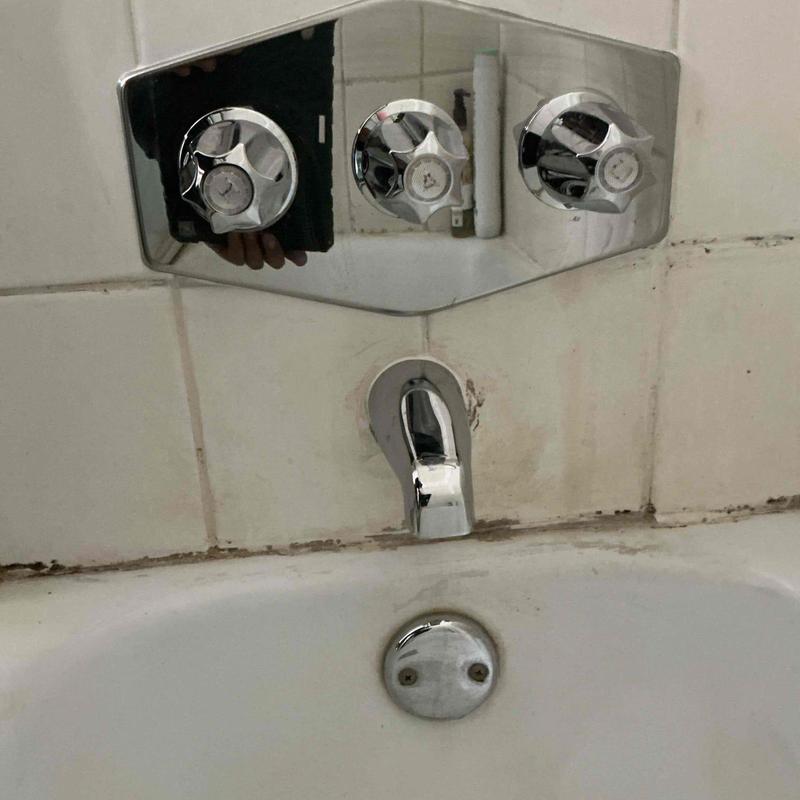 Three-handle shower valve with tub spout and trim kit