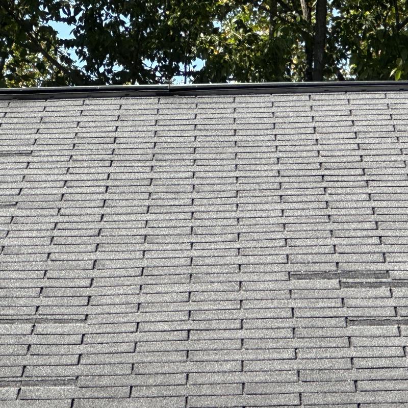 Black shadow asphalt shingles on ranch roof