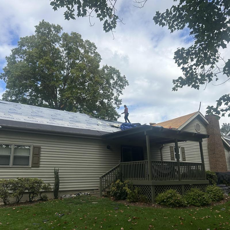 Weathered Shadow shingles roof installation in progress