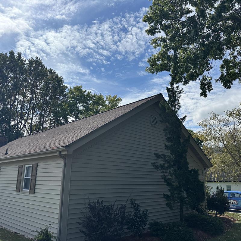 Weathered Shadow shingles on residential roof exterior
