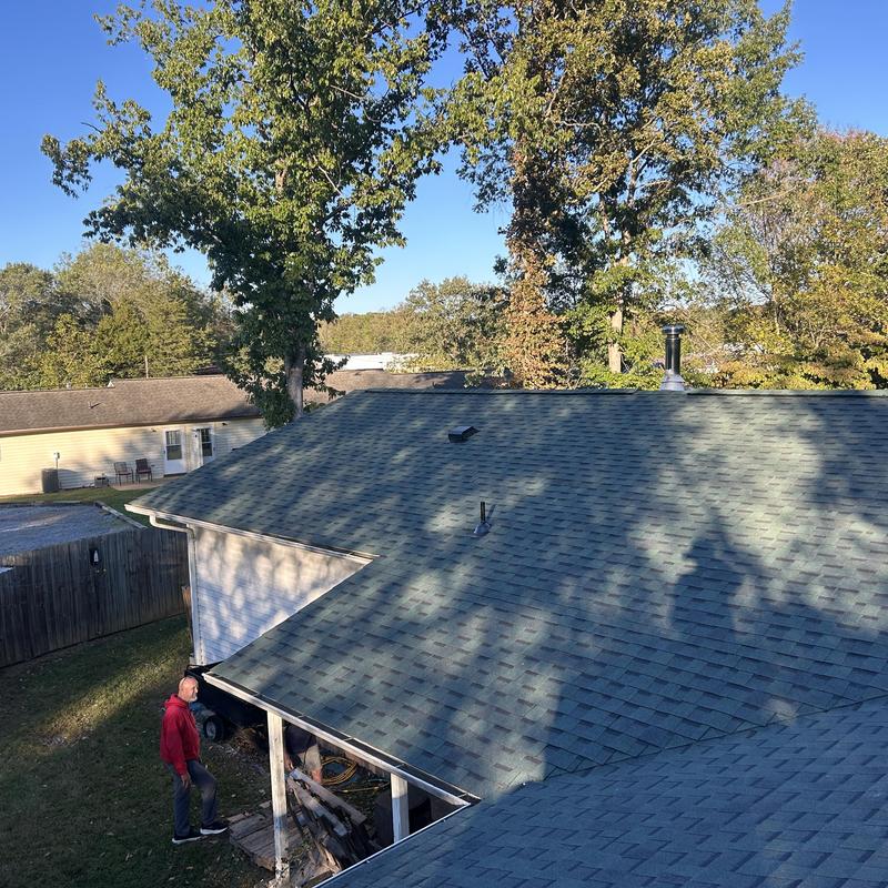 Woodland Green roof shingles on residential house