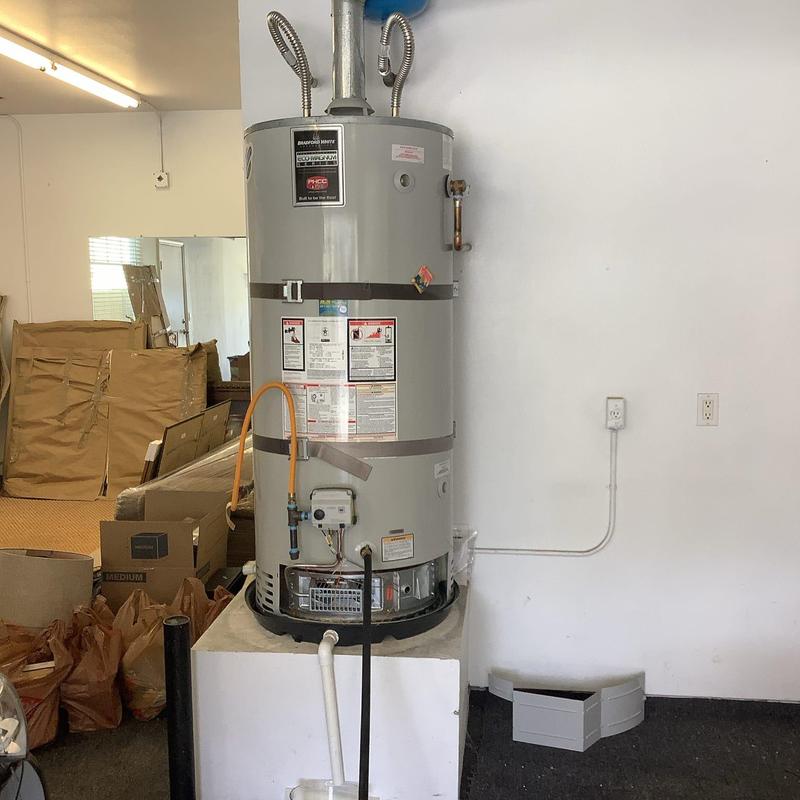 Water heater with flex connector replacement in garage