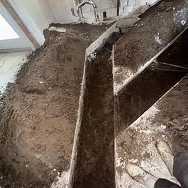 Cut floor trench for PVC drain system replacement