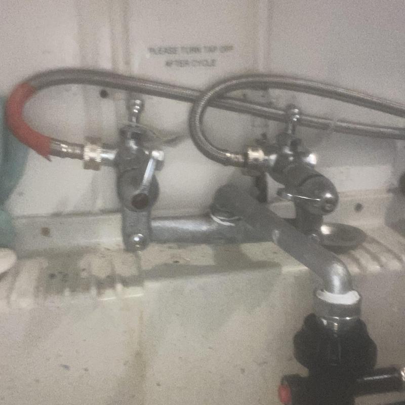 Laundry bypass lines with valves and sink pipe connections