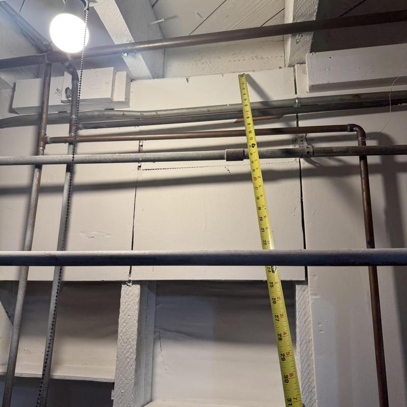 Gas line installation with measuring tape