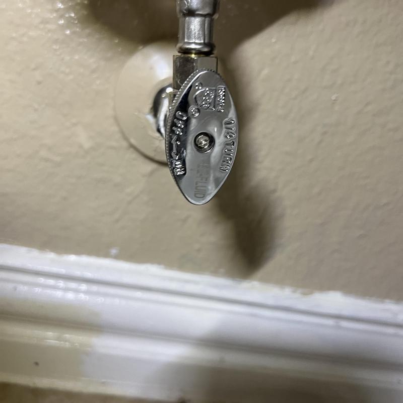 Bathroom sink angle stop shutoff valve on wall