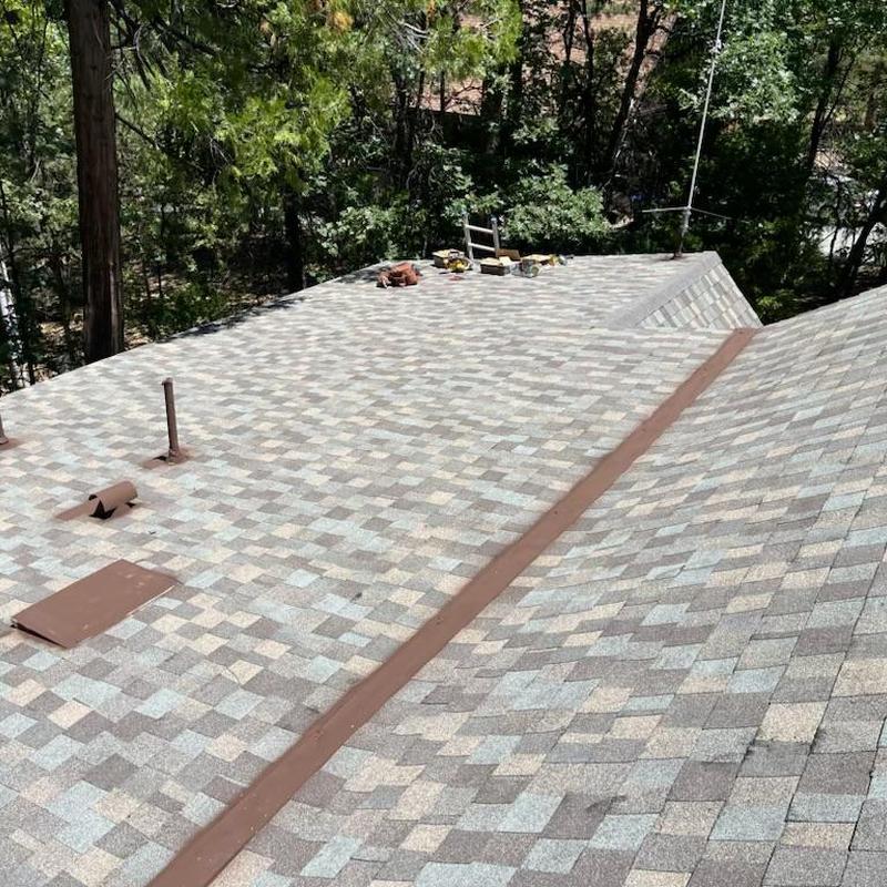 Shingle roof with new OSB decking and dry rot repair