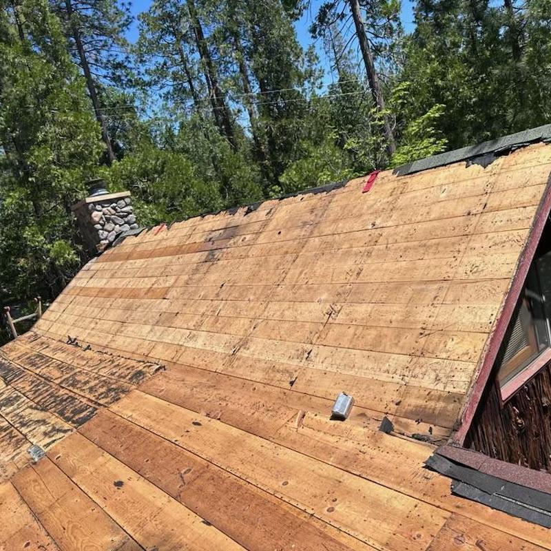 OSB roof decking removal on cabin roof in Twain Hart