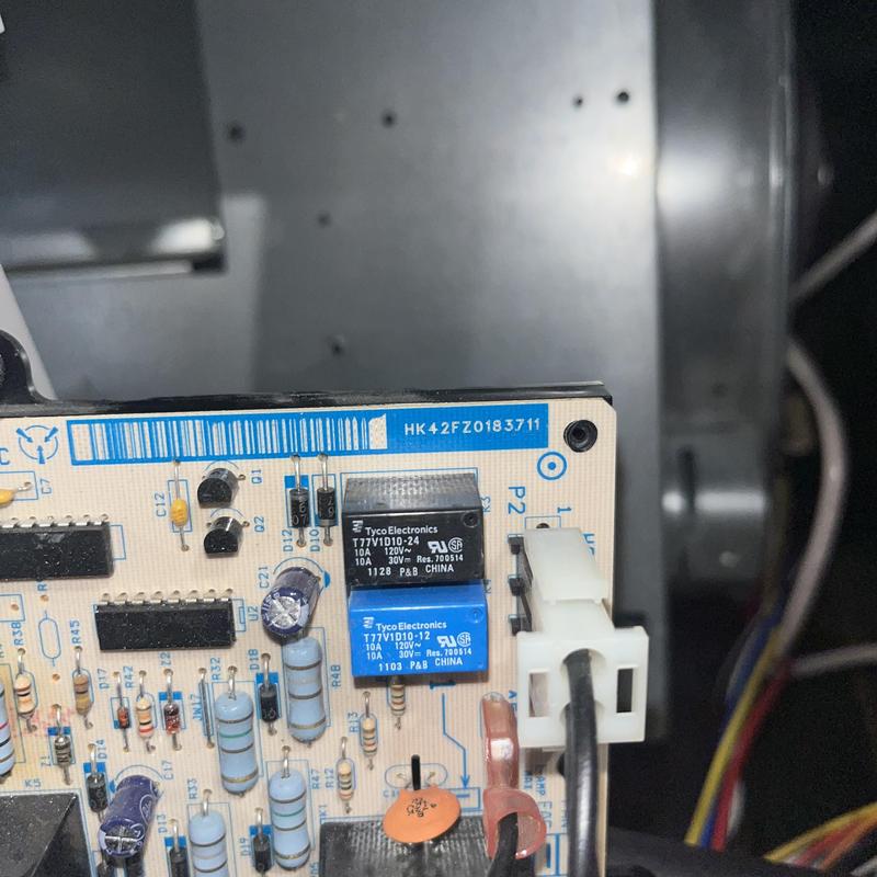 Control board on Heil gas furnace with wiring and components Control board on Heil gas furnace with wiring and components