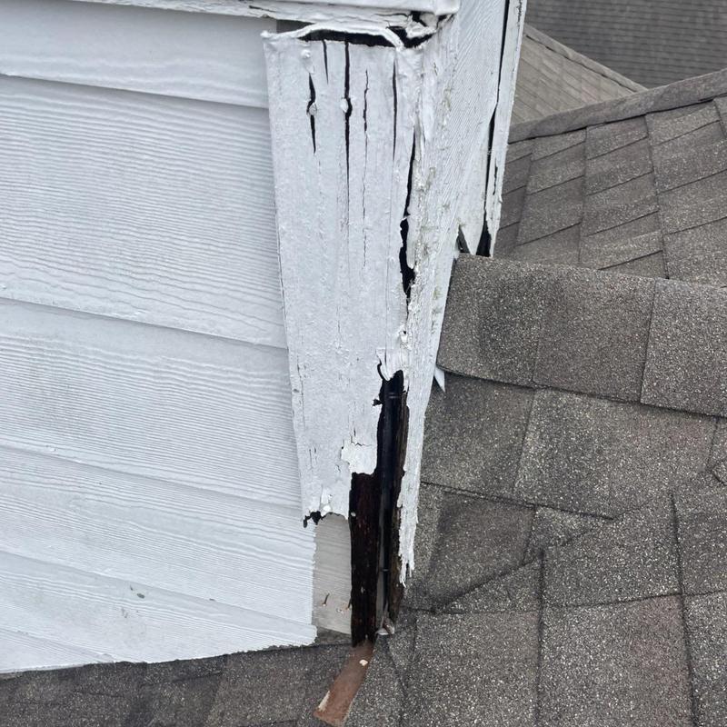 Chimney siding with severe wood rot and damage