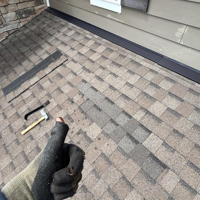 Asphalt shingle roof with hail damage inspection and tools