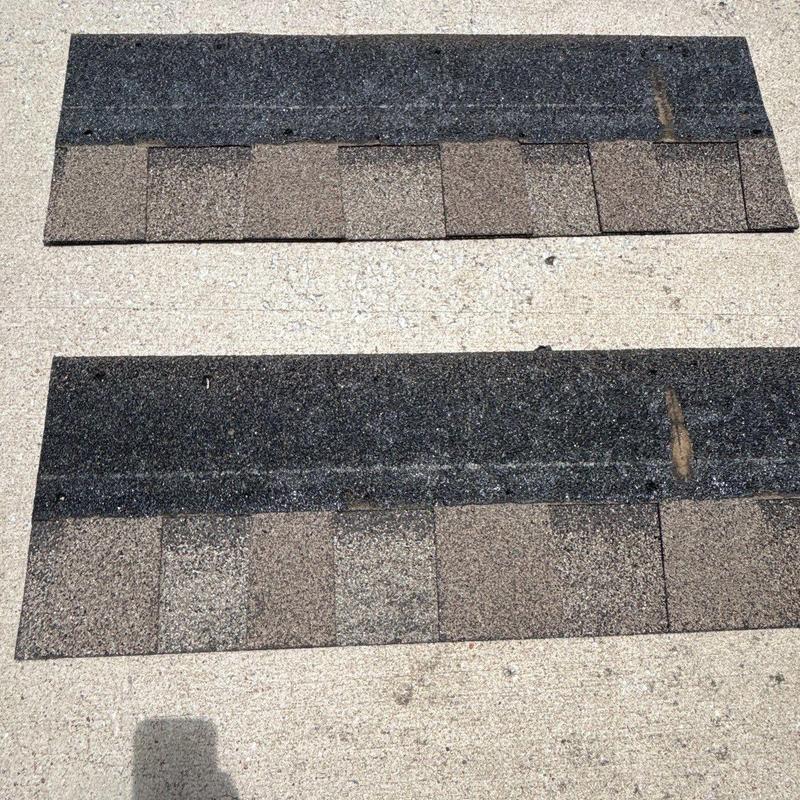 Asphalt shingles with hail damage and wear