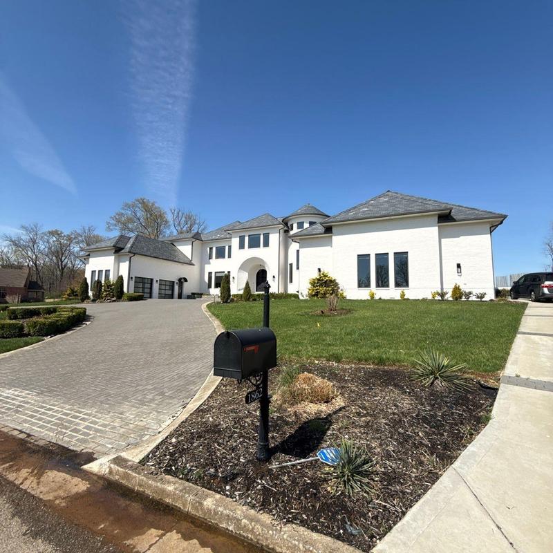 Roof shingles with hail damage on residential home