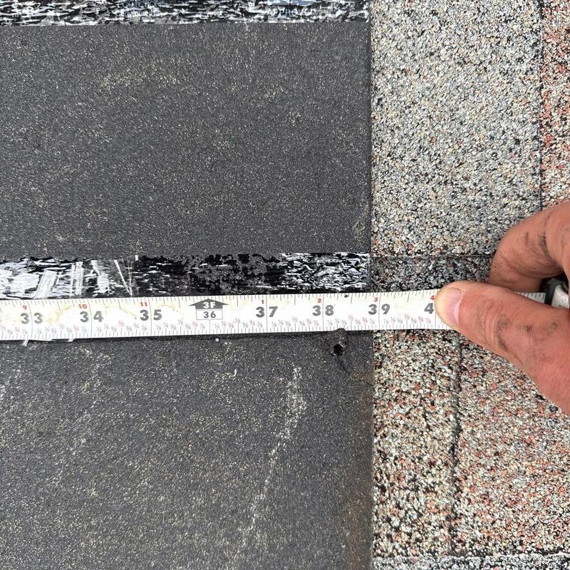 Asphalt shingle measurements during roof inspection