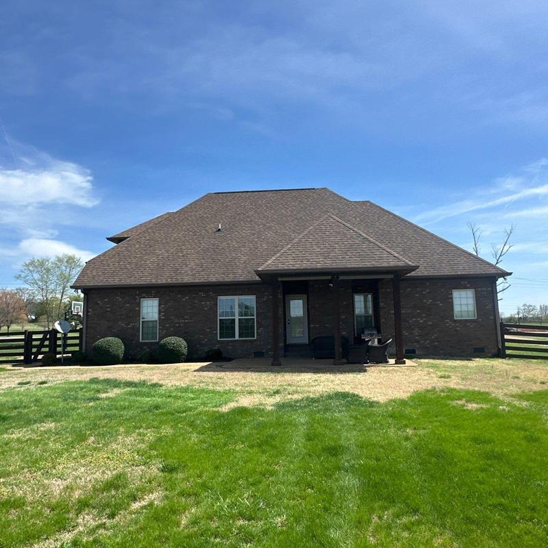 Asphalt shingle roof with hail damage inspection