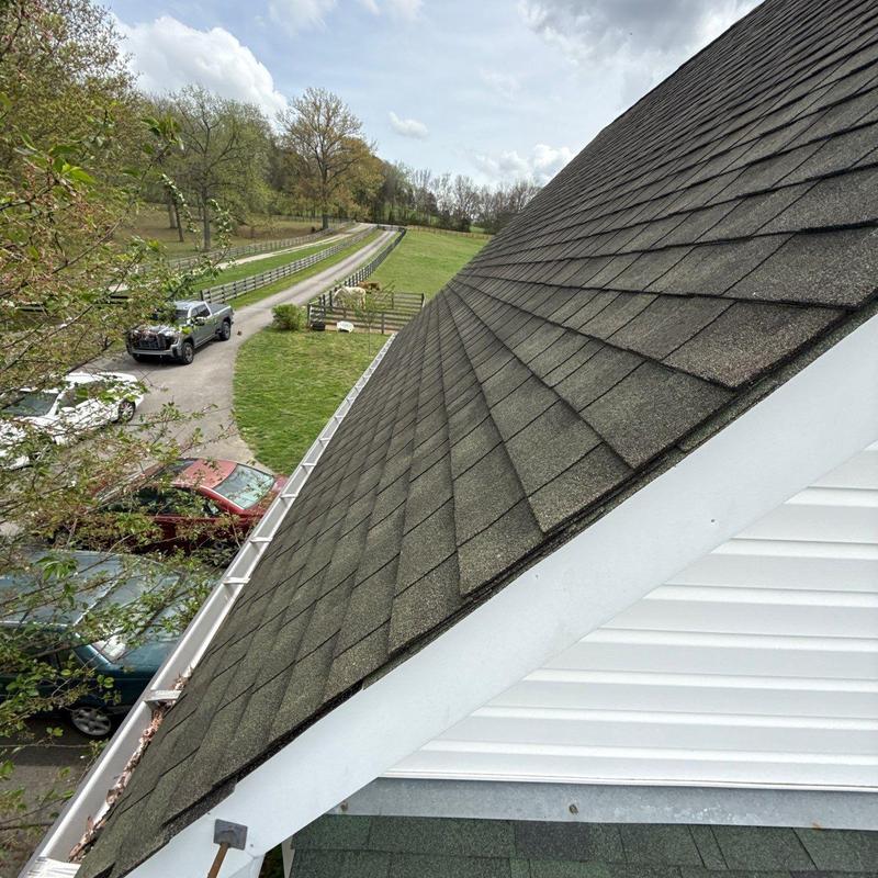Asphalt shingle roof with gutter and ventilation inspection