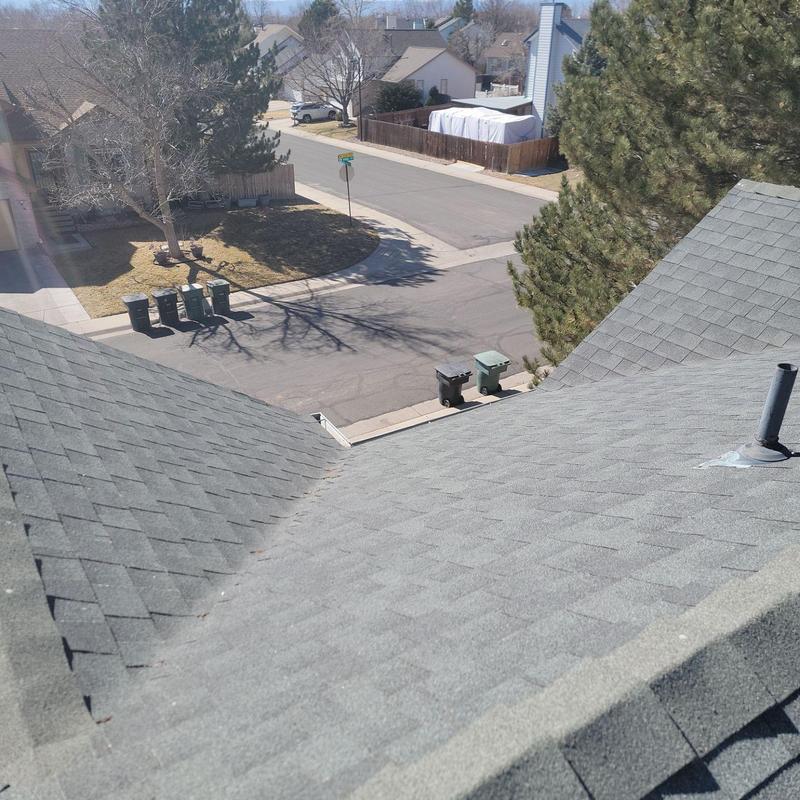 Shingle roof with sealed pipe jack and flashing repairs Shingle roof with sealed pipe jack and flashing repairs