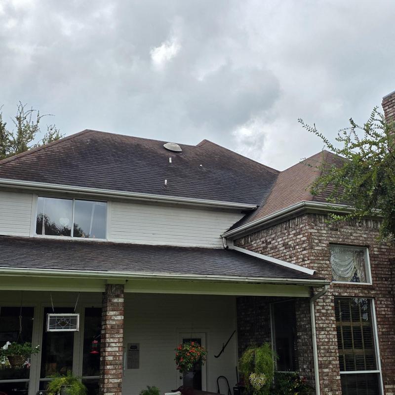 Roof shingles and gutters on residential house