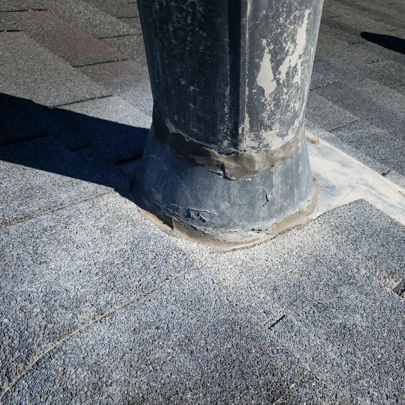 Pipe jack resealed with new storm collar on roof shingles Pipe jack resealed with new storm collar on roof shingles