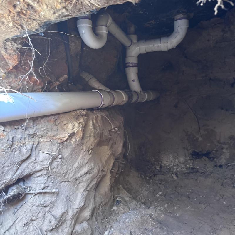 Sewer pipe system tunneling and repair in soil trench