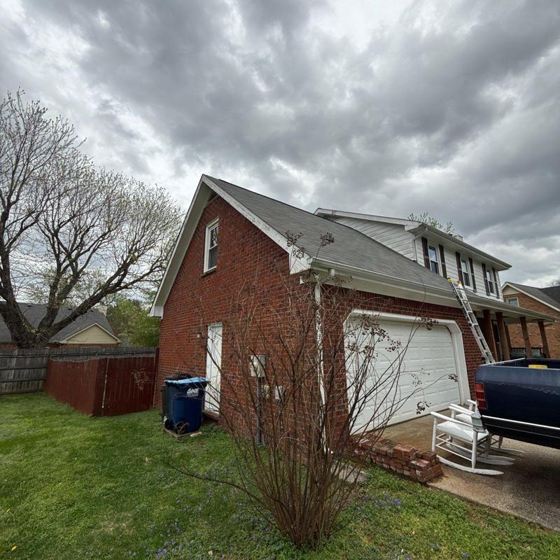 Asphalt shingle roof with ladder for inspection