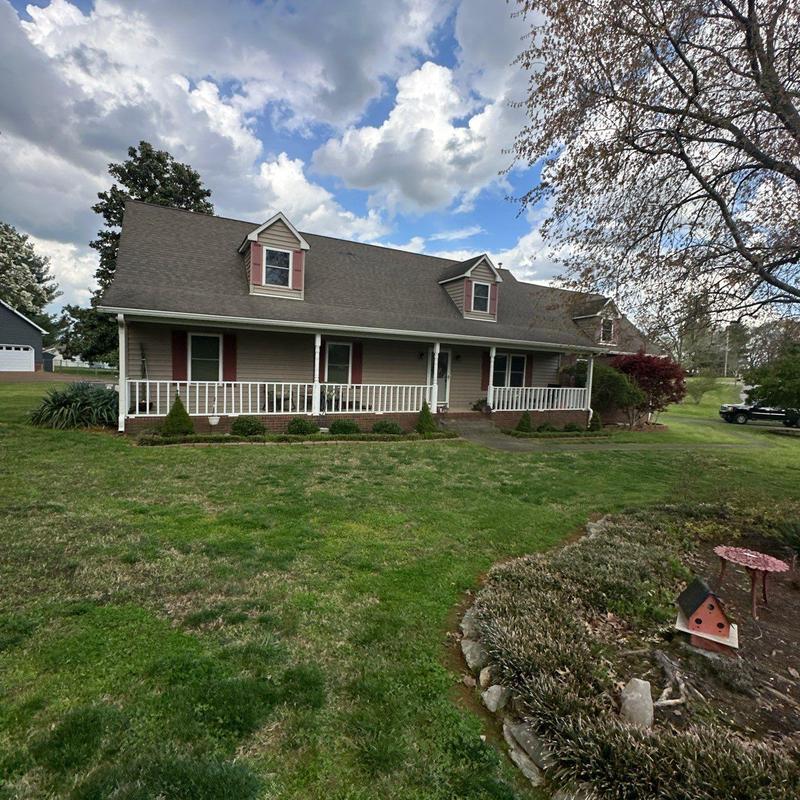 Roof shingles and ridge inspection on residential home