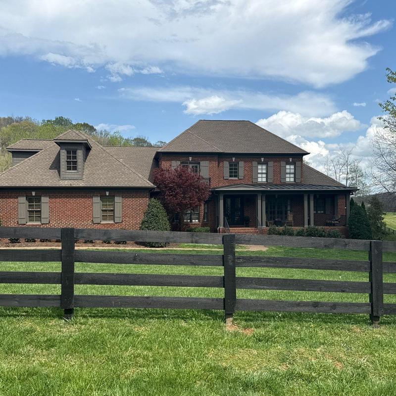 Asphalt shingle roof with hail damage inspection