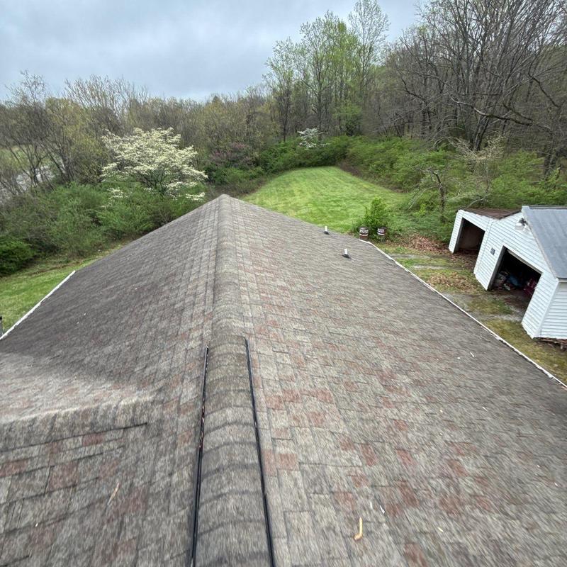 Asphalt shingle roof with ridge and vents inspection