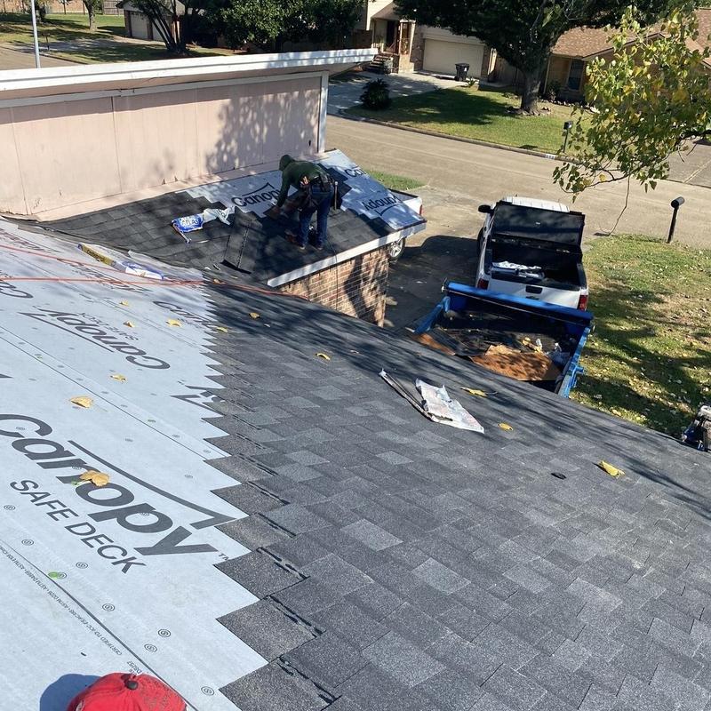Architectural asphalt shingles installation on residential roof