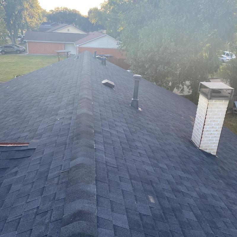Architectural asphalt shingle roof with chimney and vents
