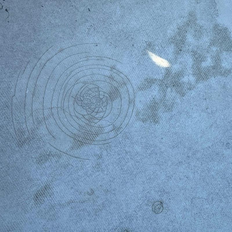 PVC flat roof hail damage inspection with spiral crack markings