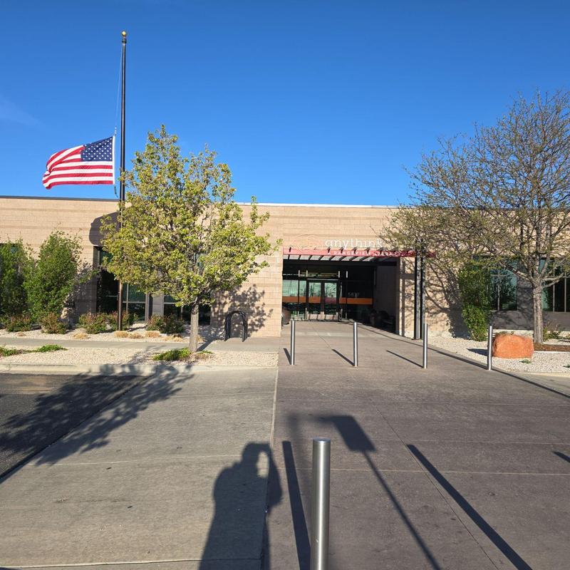 TPO flat roof with cracks and loose seams at library TPO flat roof with cracks and loose seams at library