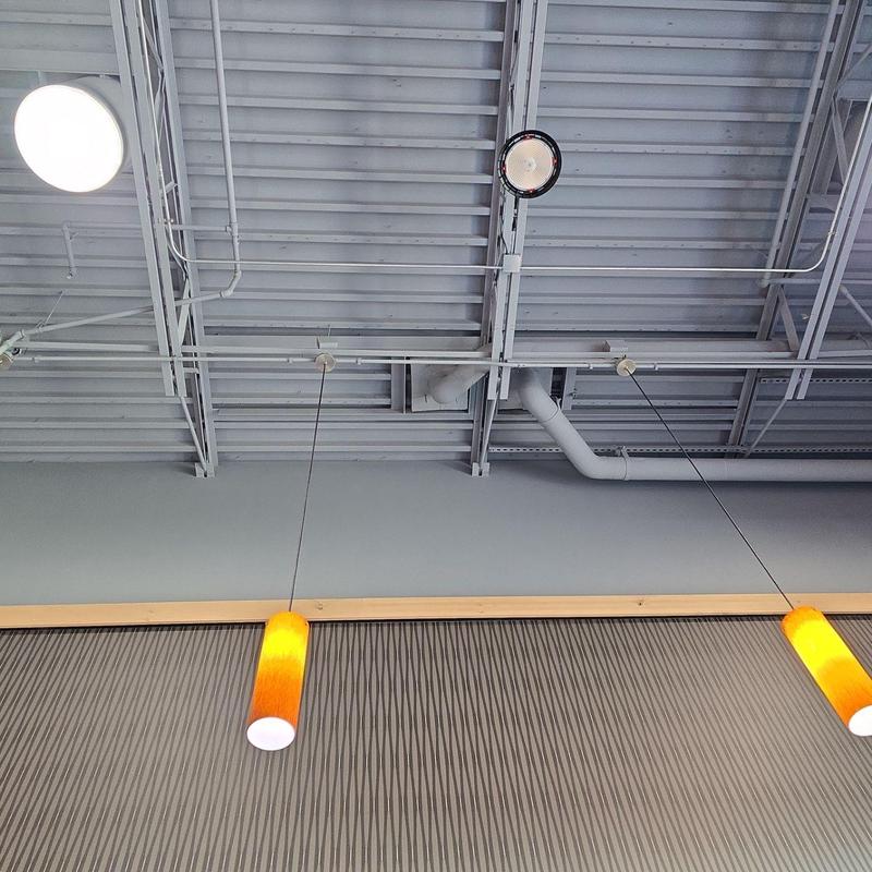 Exposed ceiling pipes and hanging pendant lights Exposed ceiling pipes and hanging pendant lights