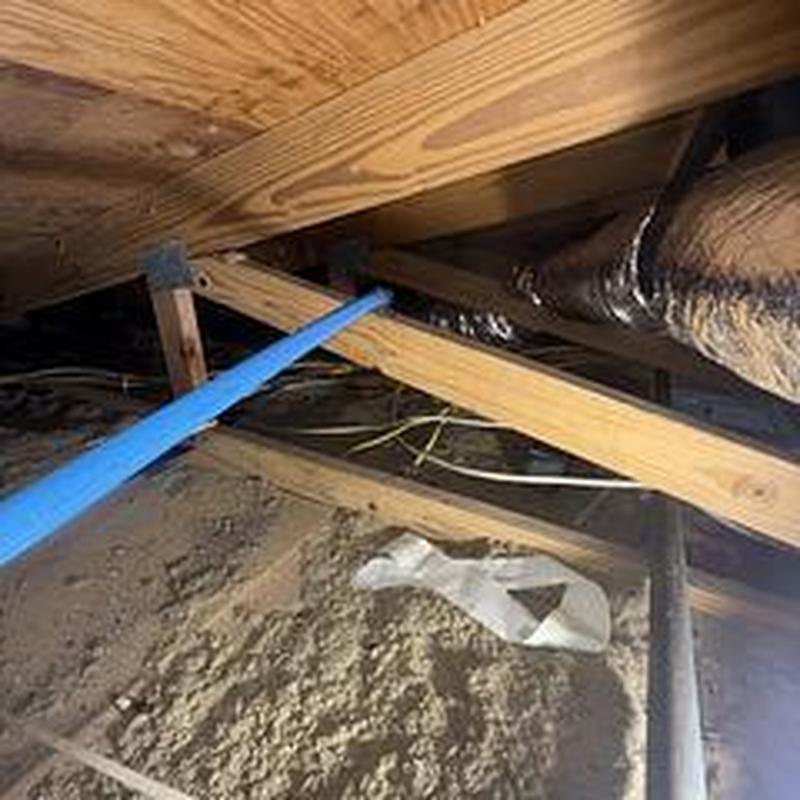 34 PEX water line running through attic with strapping