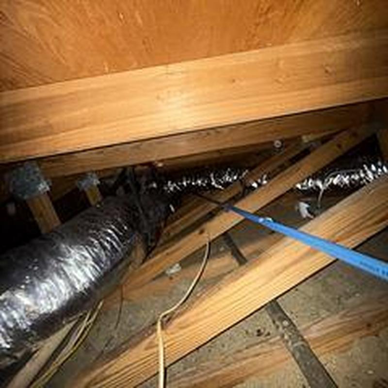 34 copper water line rerouted overhead in attic space