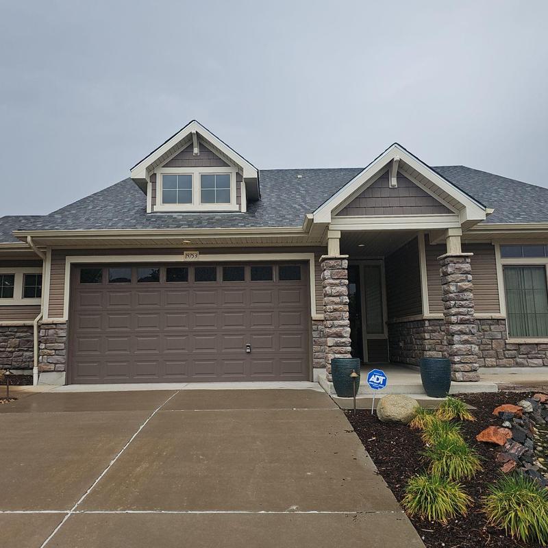 Estate Gray Owens Corning Class 4 Storm Impact shingles on roof Estate Gray Owens Corning Class 4 Storm Impact shingles on roof