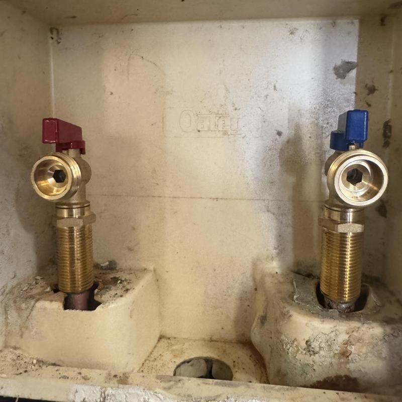Laundry water supply valves with red and blue handles