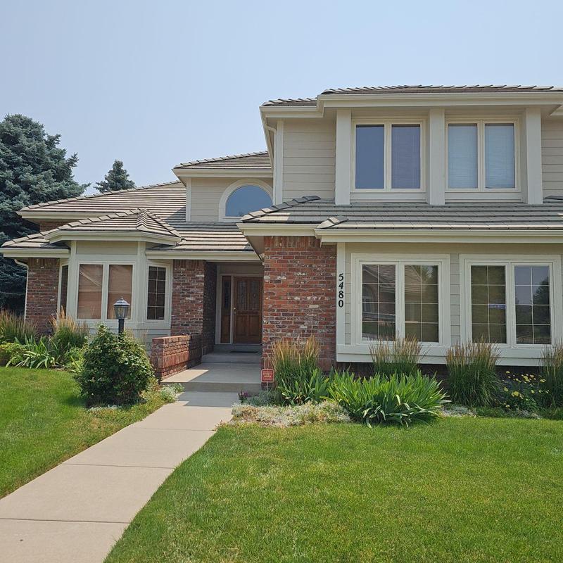 Skylight flashing resealing with silicone on roof Skylight flashing resealing with silicone on roof
